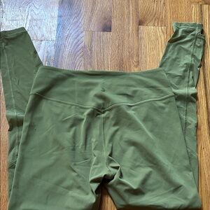 Lululemon Olive Green Leggings with stirrup style bottoms- like new